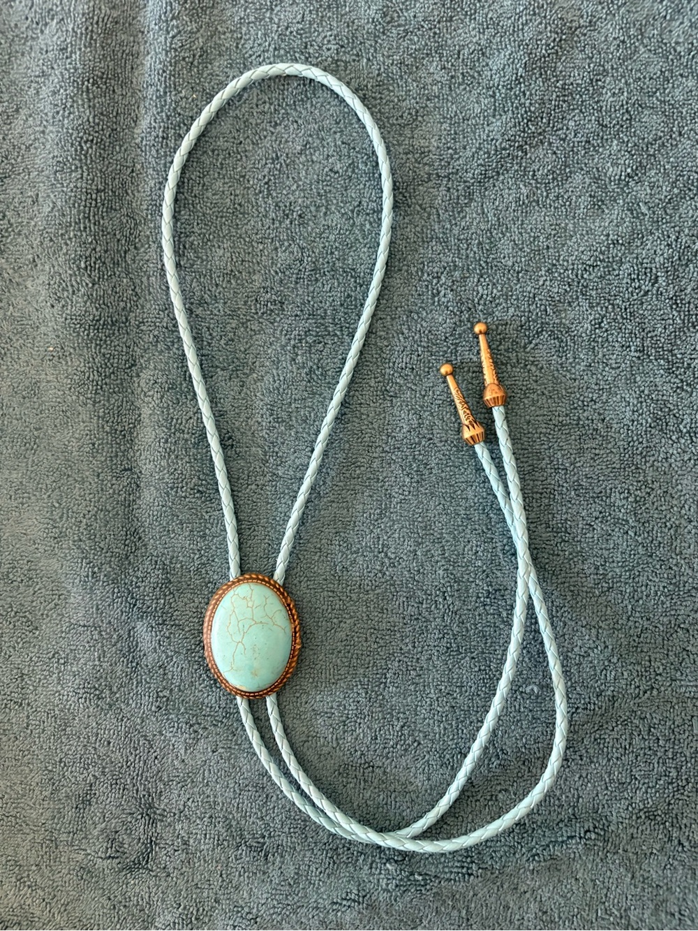 Light Blue Turquoise-Style Bolo Tie with Copper Accents